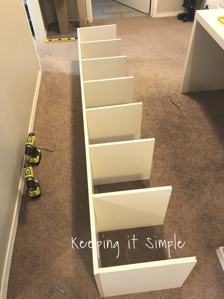 https://www.keepingitsimplecrafts.com/wp-content/uploads/2019/12/DIY-cube-organizer-shelf-Ikea-Kallax-knock-off-8-768x1024.jpg
