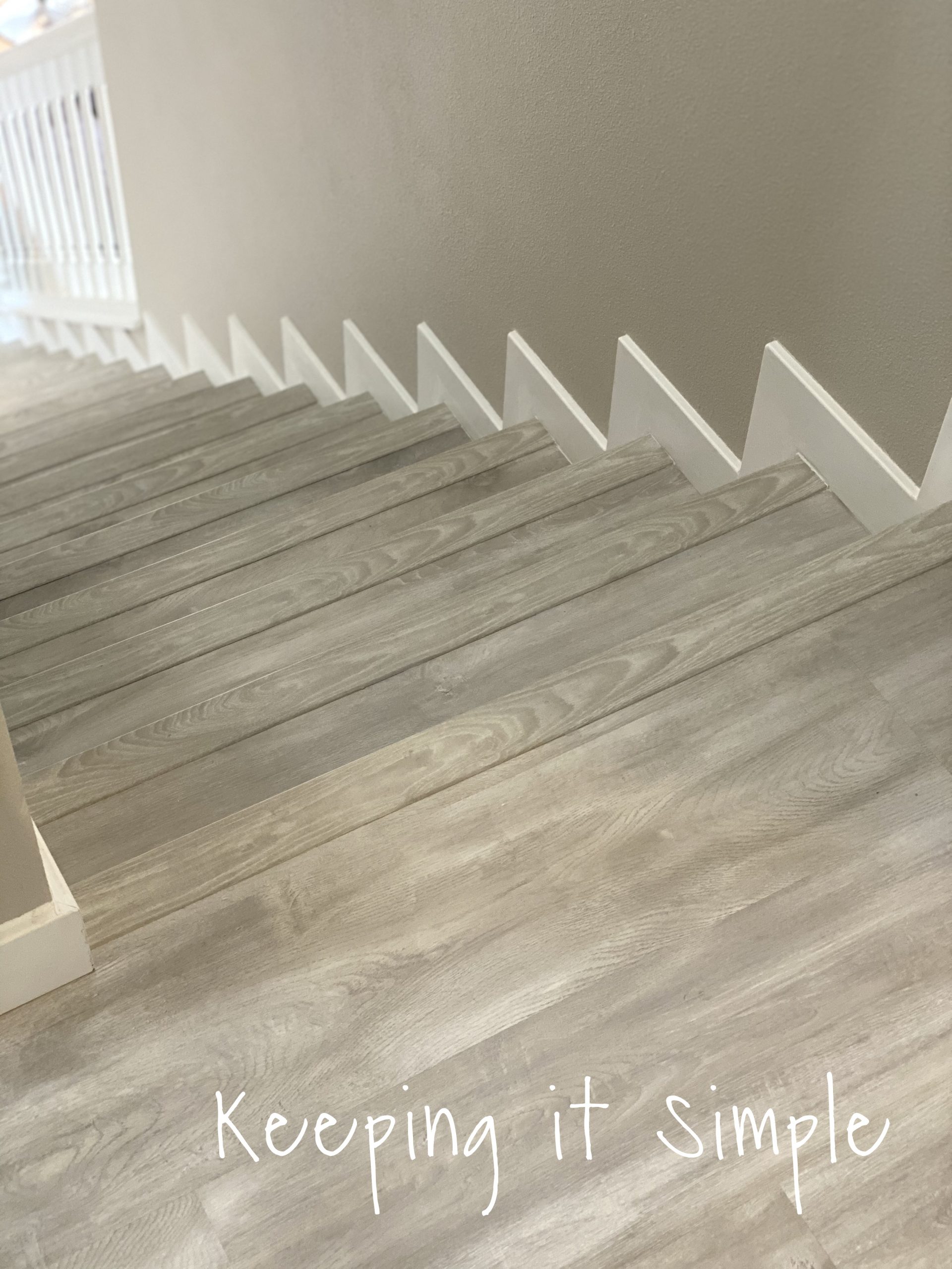 How to Install Gray Laminate Stairs with White Risers • Keeping it Simple